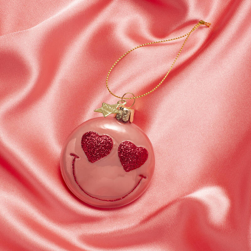 Adorno de vidrio rosa naranja sonriente